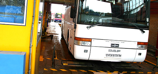 Coach over a pit lane at test centre