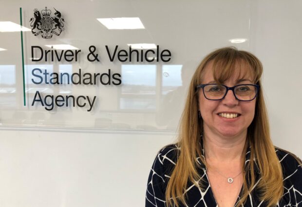 DVSA Director of Enforcement Marian Kitson standing in front of the DVSA Logo. Reads: Driver and Vehicle Standards Agency.